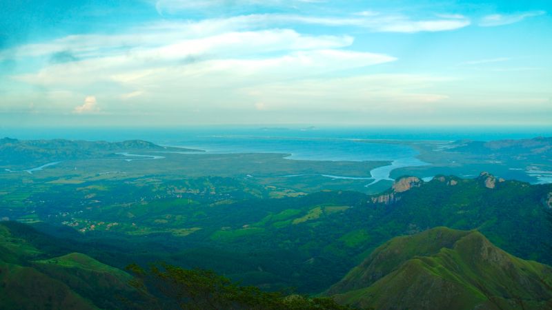 The mountainside view reaching up to the Pacific