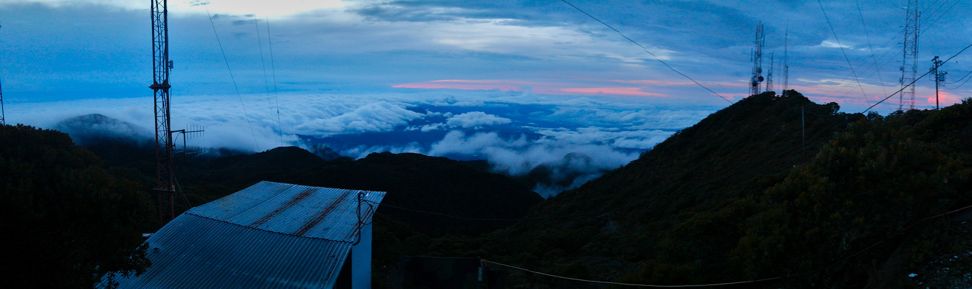 Panorama of the sunrise with clouds from the summit